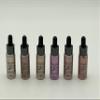 Dream Gl Shimmer Highlighter and Illuminating Drops Set, 6 Pieces 1 each Glo Digger, Glo to Havana,Glo Faced, Glo Glo Girl, Glo Goddess, Glomazing. Bottles are glass and about 1 ounce each. view 1