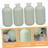 HAKIDZEL 4pcs Refillable Shampoo and Conditioner Bottles Travel Dispenser Sleek Empty Toiletries Containers for Bathroom and Travel Avocado Design view 2