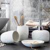 DUYHBAWRS Ceramic White Bathroom Accessory Sets Decoration Toothbrush Cup Shampoo Dispenser Soap Dish Creative Toilet Organizer Supplies view 2