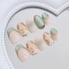 BQZQPAMZ 24Pcs Green French Almond Fake Nails Gold Flower Press on Nails Short Almond Spring Glitter Press on Fingernails Full Coverage Acrylic Nails for Women Spring Manicure Decoration view 3
