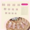 BQZQPAMZ 24pcs Gold Bow Medium Almond Fake Nails White French Tip Press on Nails Gold Curve Design Glossy Full Cover Acrylic Nails for Women DIY Spring Nail Art Decoration view 3