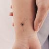 1.3 in / 3.4 cm (height) Small Blowing Dandelion Temporary Tattoo (Set of 3) view 1