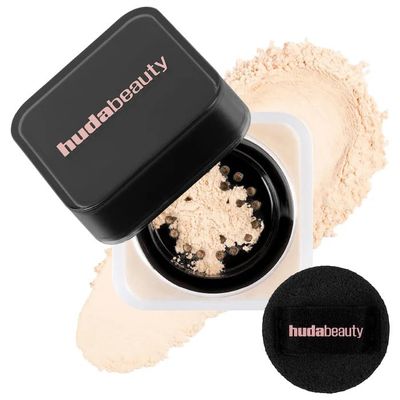 H.U.D.A - Mini E@sy Bake Loose Baking & Setting Powder - Color: Pound Cake - (fair, light, medium, and tan skin tones.) - Size: (0.21 oz/6 g)