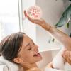 Soft Sunflower Suction Cup Bath Ball, 2-in-1 Sunflower Bathing Ball with Finger Rings, Exfoliating Mesh Bath Sponge Cleaning Brush, Shower Loofah Sponge for Women Men (1Pc - Orange) view 2
