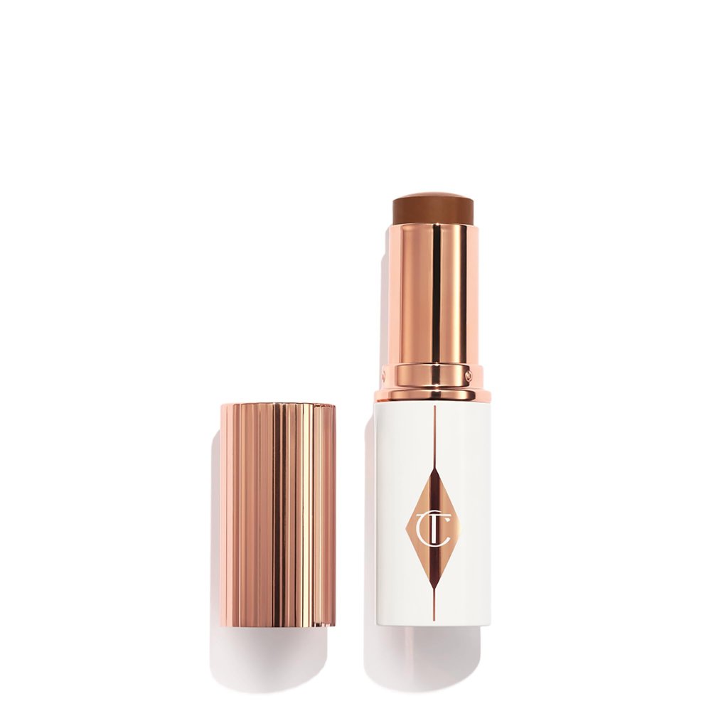 Charlotte Tilbury Unreal Skin Tint & Sheer Glow Hydrating Foundation Stick - Cream Foundation Makeup with Sheer-to-Light Coverage & a Buildable Formula - Blurring, Smoothing & Nourishing - 15 Deep