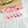 24Pcs Christmas French Tip Press on Nails Medium Almond Red Christmas Tree Stars Fake Nails White Bow Glue on Nails Pink Acrylic Nails for Women Winter Nail Decoration Supplies view 3