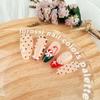 24Pcs Christmas French Tip Press on Nails Medium Almond Cute Candy Canes Fake Nails Red Green White Glue on Nails Glossy Acrylic Nails for Women New Years Manicure Gift Nail Decoration view 3