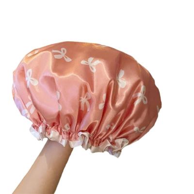 2 double layered shower caps