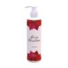 Christmas Lotion  Red Flower Design | Fresh Green Tea & Lemon Scent | 12 Pack 16 oz Pump Bottles | Elegant Poinsettia Holiday Decor for Bathrooms & Guest Suites | Paraben-Free, Made in USA view 1