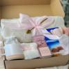 New Mom Gift Box Postpartum Care Package with Scented Candle, Mug & Fuzzy Socks Thoughtful New Mom Gifts After Birth, Baby Shower, Pregnancy, Self Care Gift for Women (Pink Box) view 1