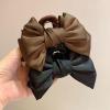 VIDI Hair accessories are elegant and, with a satin bow and fabric Grasp clip view 4