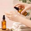 Roshtia 30 Pack Empty Refillable Amber Glass Pump Bottles with Black Pump, Travel Small Containers for Lotion, Cream, Essential Oils, Aromatherapy Liquids and More(60ml /2oz) view 4