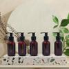 Bottiful Home - 3 oz Amber Travel Pump Plastic Bottles Set of 5 Refillable Toiletry Containers with Gold Printed Labels  TSA Approved view 3