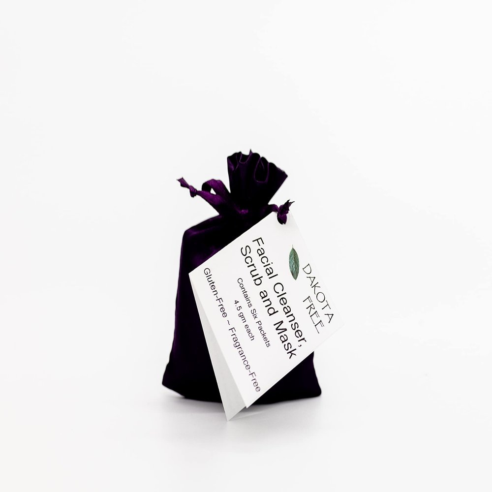 Dakota Free Facial Cleanser, Scrub and Mask Six Singles in Purple Bag