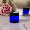 (12 pack) 2 oz Cobalt Blue Plastic Jar with Black Smooth Foam Lined Lids view 4